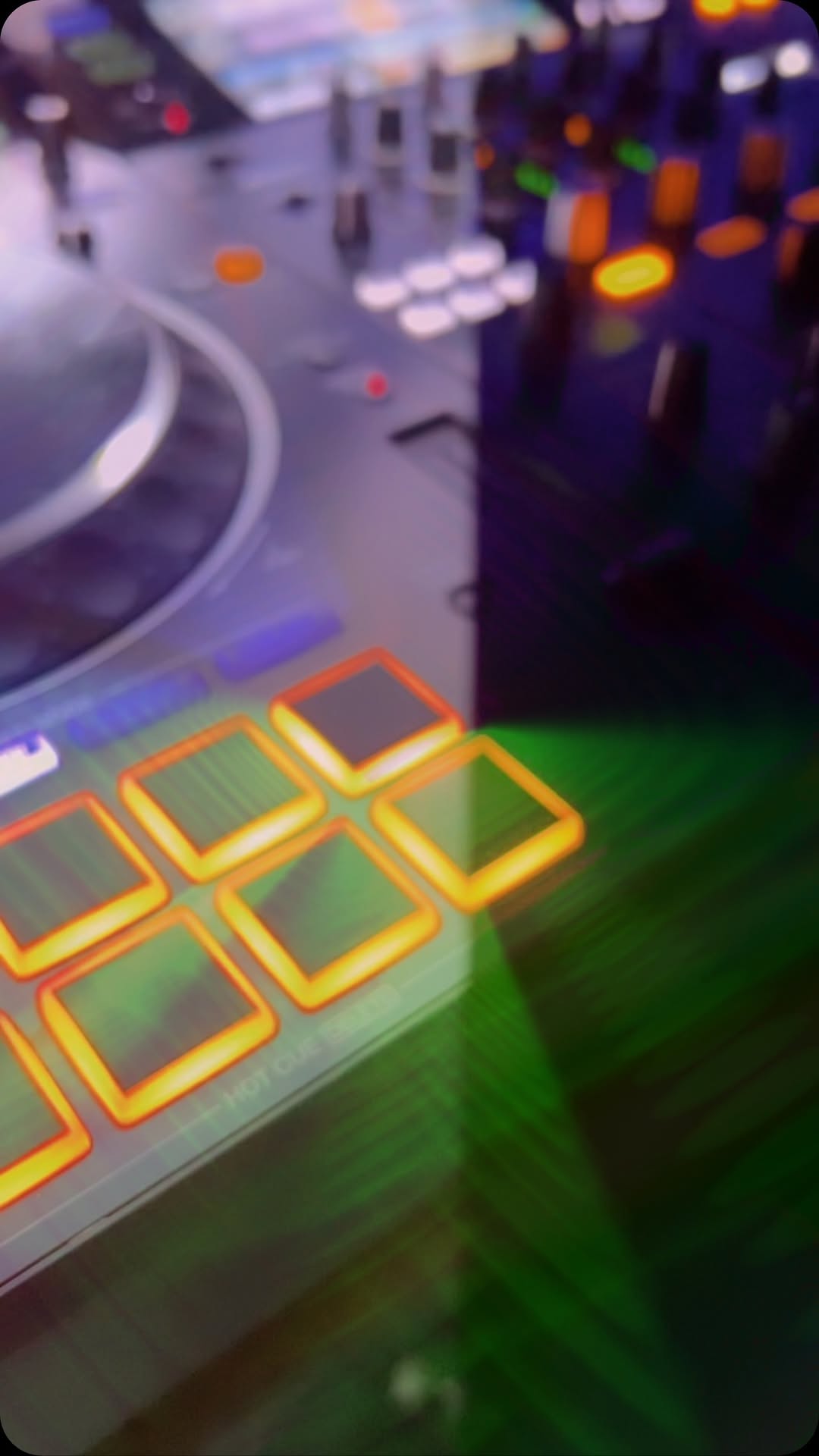 DJ controller pads glowing during a wedding set